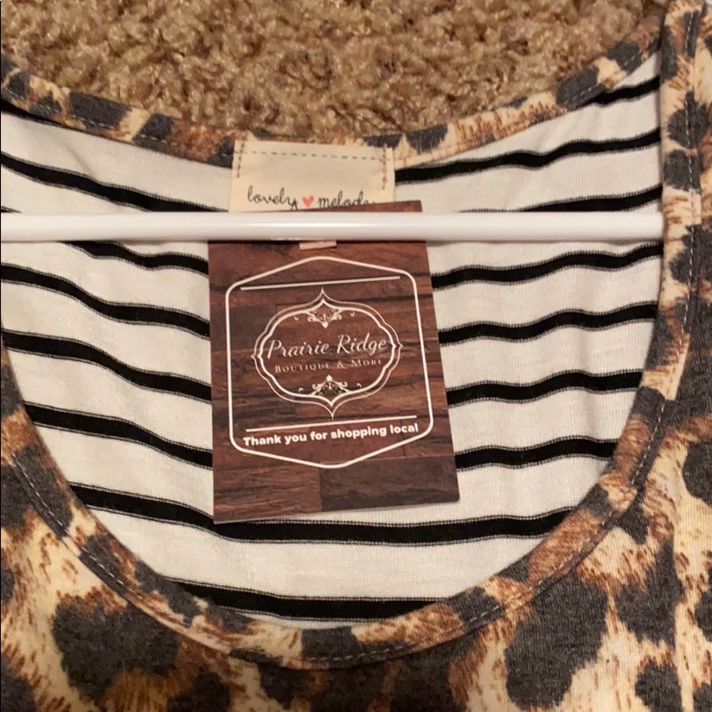 Tank - Picture 2 of 2